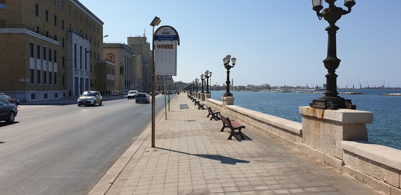 This is what a bus stop in Bari looks like: a stand with route numbers