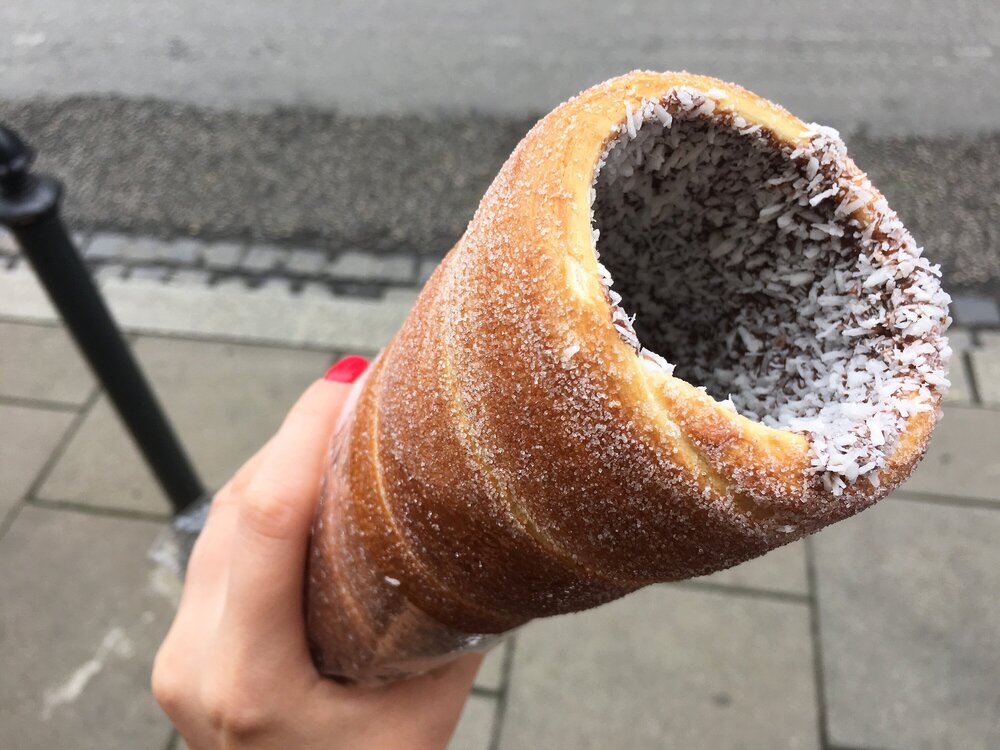 Trdelnik with chocolate cream and coconut shavings