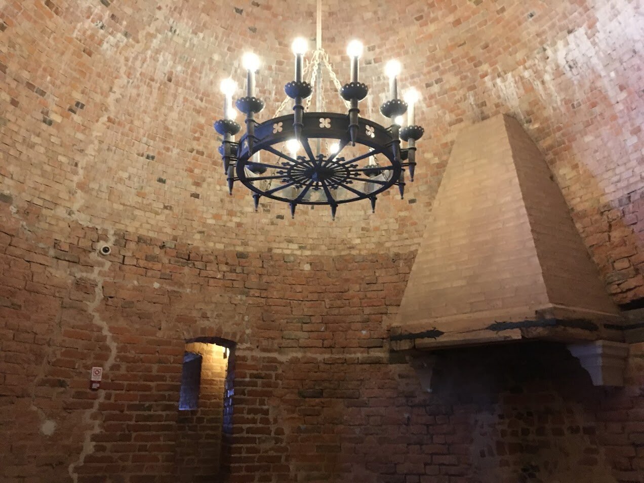 Renovation of the large chandelier and fireplace in the tower