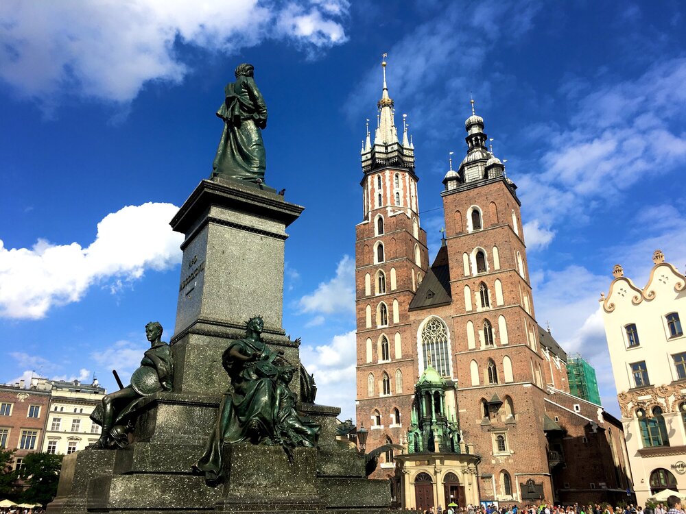 Adam Mickiewicz Monument, in the background - Mariacki Church