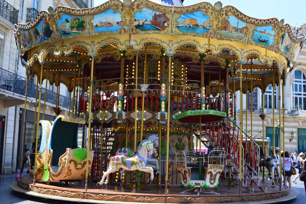 Both children and adults can ride the carousel