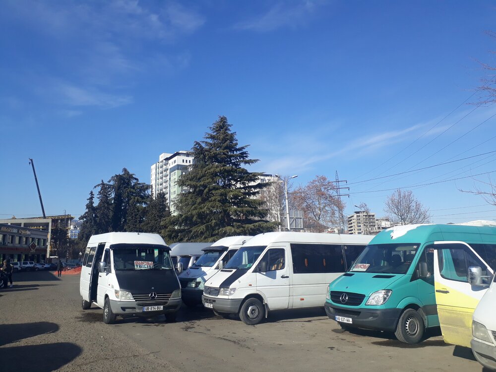 The minibuses are waiting for their turn to leave