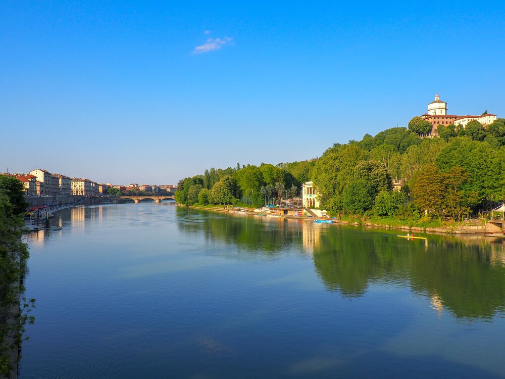 The Po River and the stone bridge in the distance