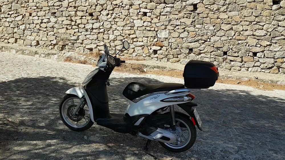 One of the most budget-friendly options for getting around the island is a rented scooter