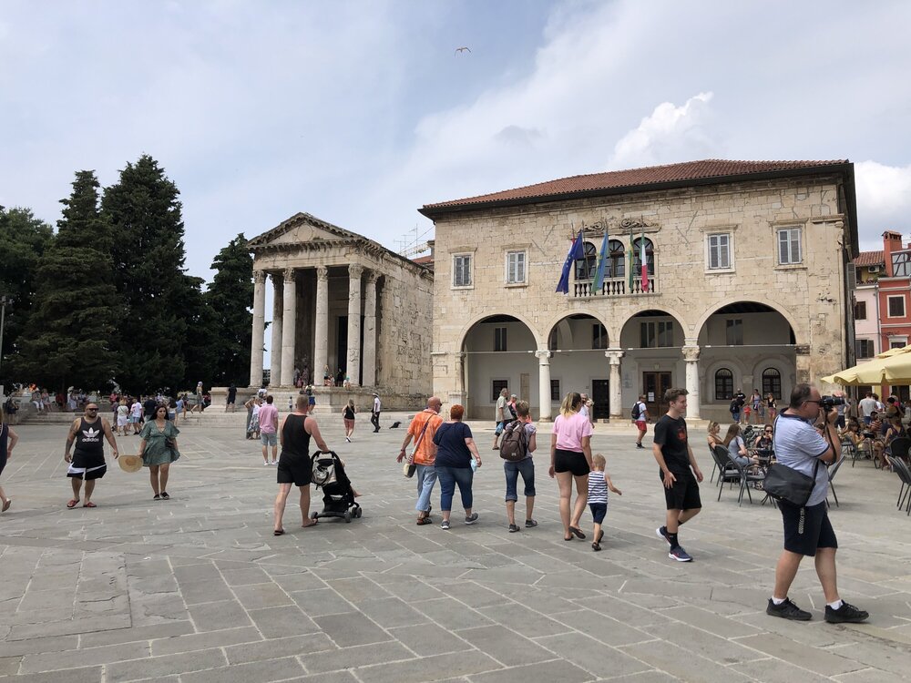 Approximately 15 centuries separate these buildings
